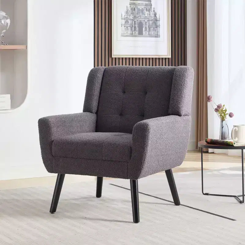 Poltrona moderna con bottoni Okak, poltrona da soggiorno imbottita con braccioli e gambe in legno nero, ergonomica per camera da letto