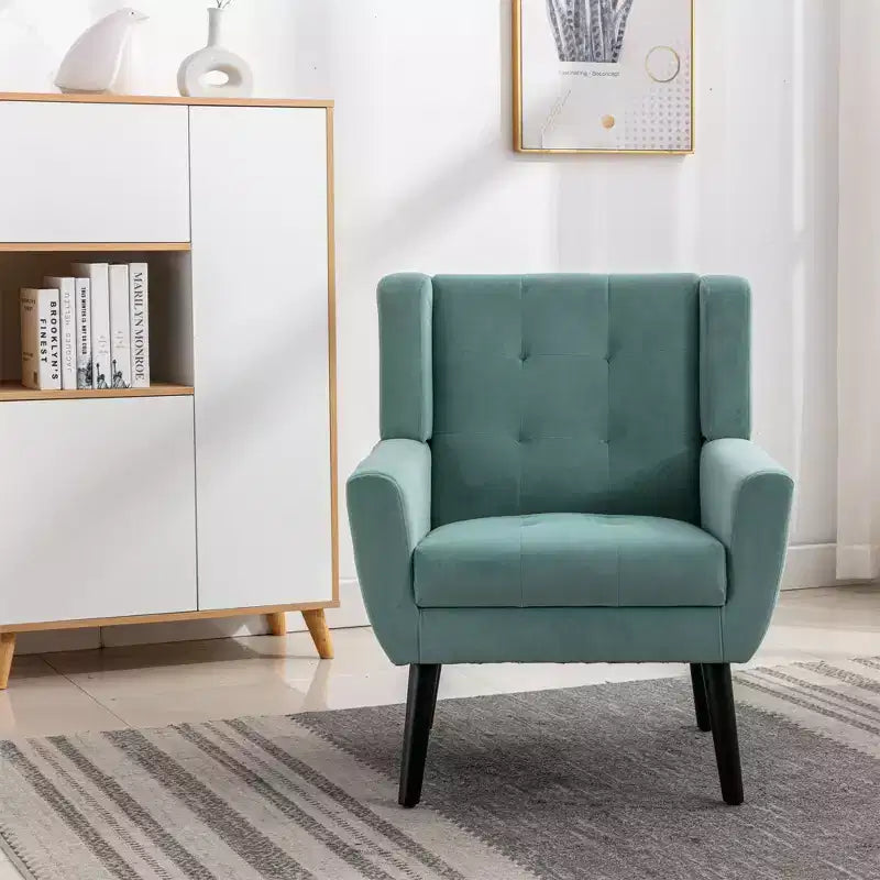 Poltrona moderna con bottoni Okak, poltrona da soggiorno imbottita con braccioli e gambe in legno nero, ergonomica per camera da letto