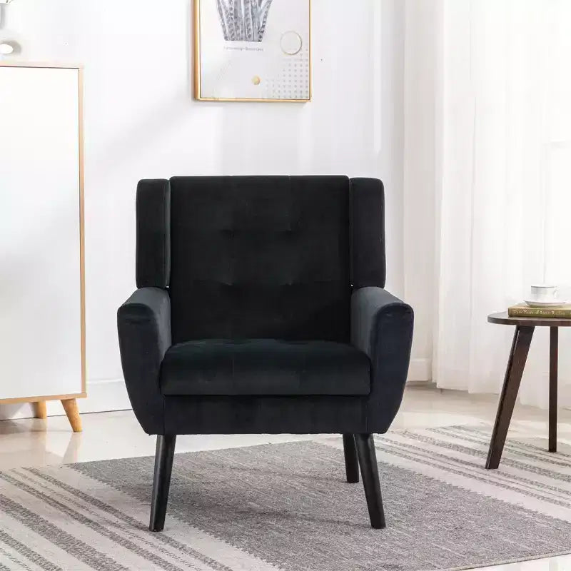Poltrona moderna con bottoni Okak, poltrona da soggiorno imbottita con braccioli e gambe in legno nero, ergonomica per camera da letto