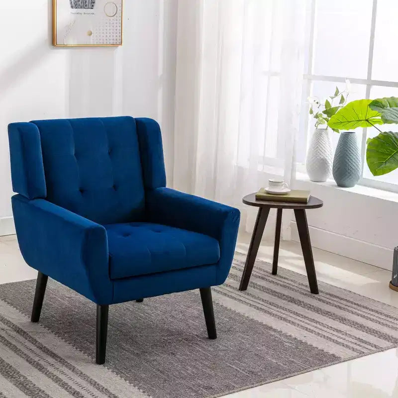 Poltrona moderna con bottoni Okak, poltrona da soggiorno imbottita con braccioli e gambe in legno nero, ergonomica per camera da letto