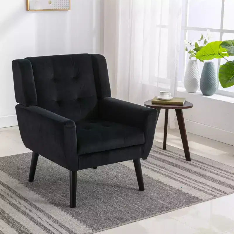 Poltrona moderna con bottoni Okak, poltrona da soggiorno imbottita con braccioli e gambe in legno nero, ergonomica per camera da letto