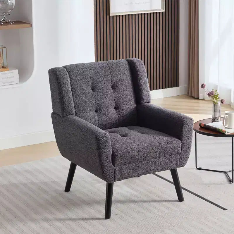 Poltrona moderna con bottoni Okak, poltrona da soggiorno imbottita con braccioli e gambe in legno nero, ergonomica per camera da letto