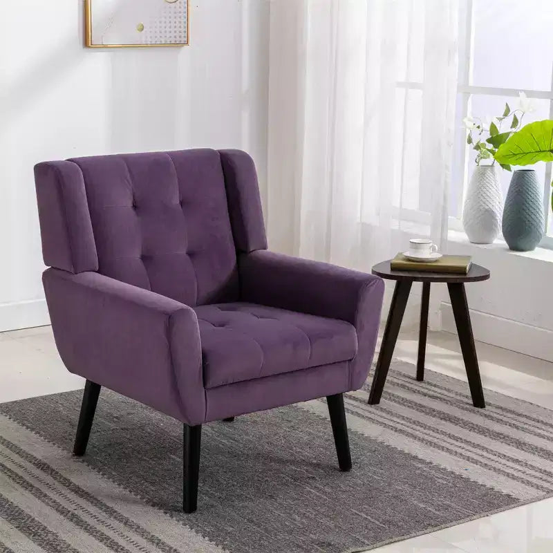 Poltrona moderna con bottoni Okak, poltrona da soggiorno imbottita con braccioli e gambe in legno nero, ergonomica per camera da letto