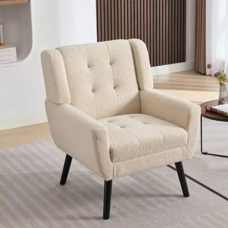 Poltrona moderna con bottoni Okak, poltrona da soggiorno imbottita con braccioli e gambe in legno nero, ergonomica per camera da letto