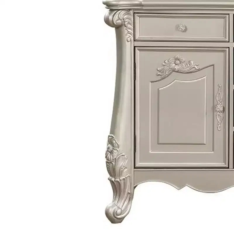 Comò Bently 71" Acme Furniture con finitura color champagne