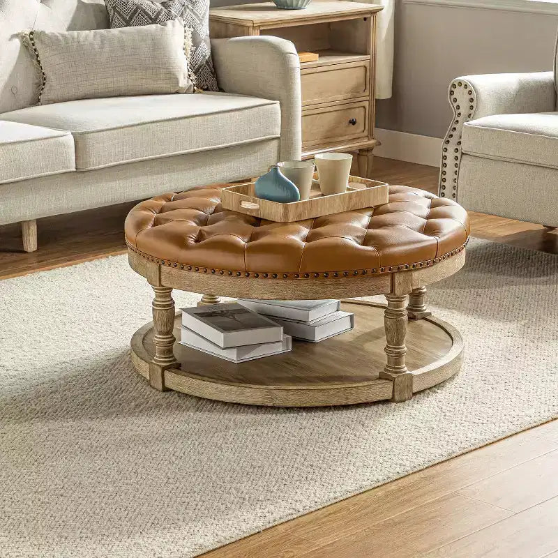 Pouf rotondo Chloe in pelle vegana con contenitore e borchie | ART OF LIVING DESIGNS