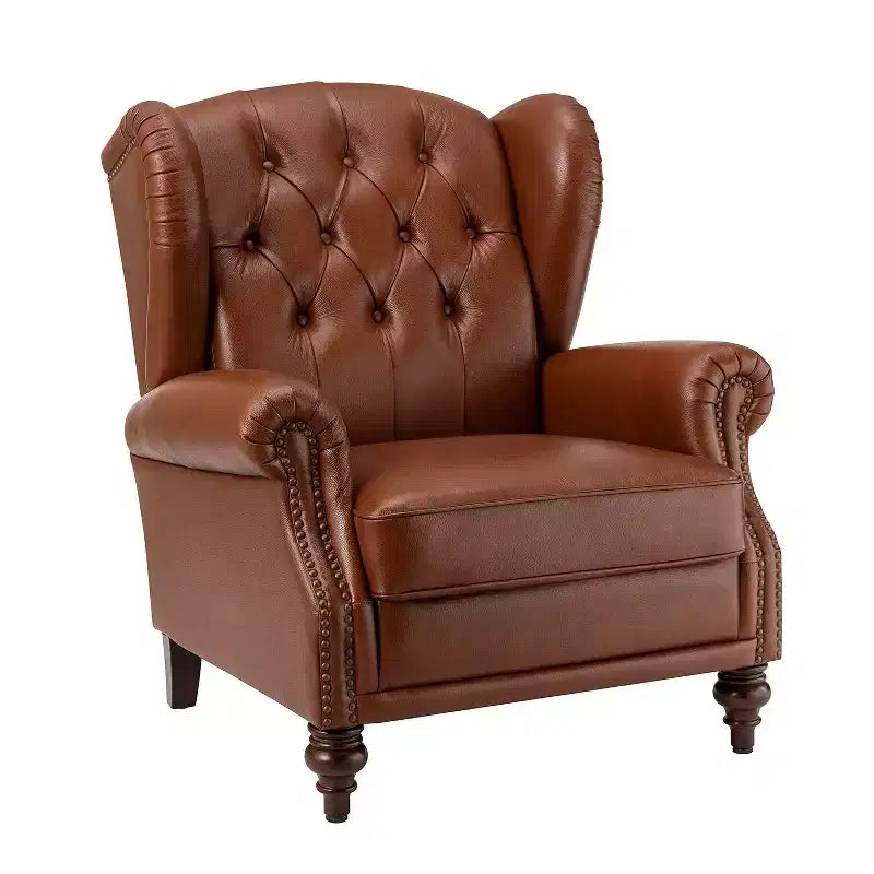 Poltrona a pozzetto Amanda 33, ampia, in vera pelle con gambe coniche in legno massiccio e bordo con borchie | ART OF LIVING DESIGNS