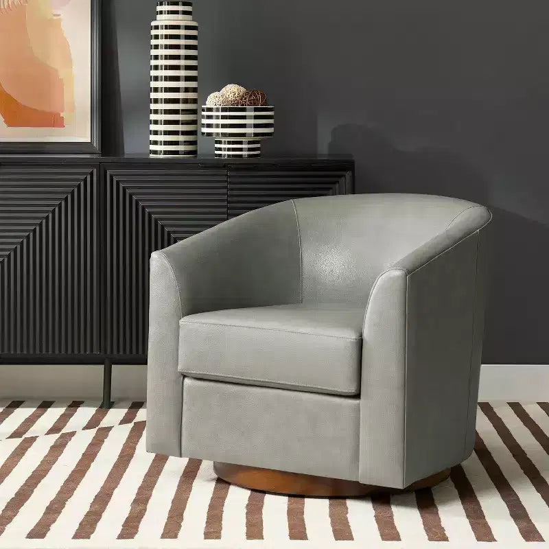 Poltrona a botte girevole a 360 gradi Molly Modern in vera pelle con base in legno massello|ART OF LIVING DESIGNS